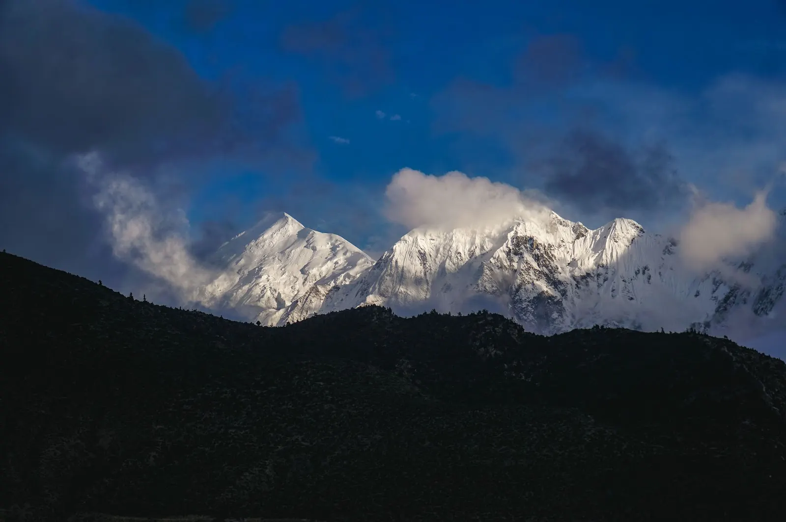Himalayan summits emerging from clouds